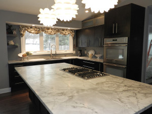 Modern Cabinetry with White marble Counter Tops